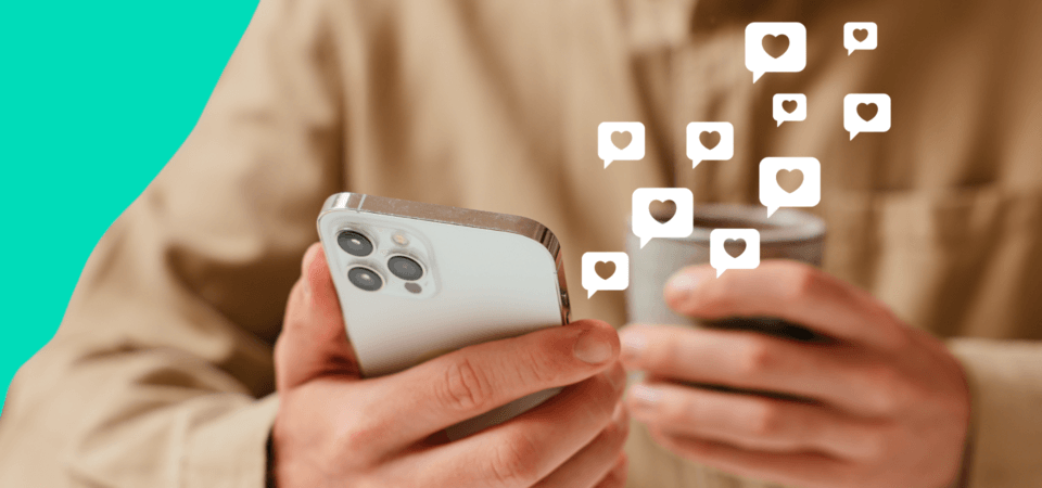 Man holding an iphone surrounded by messaging icon notifications