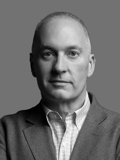 Black and white headshot of Tom J. Thompson