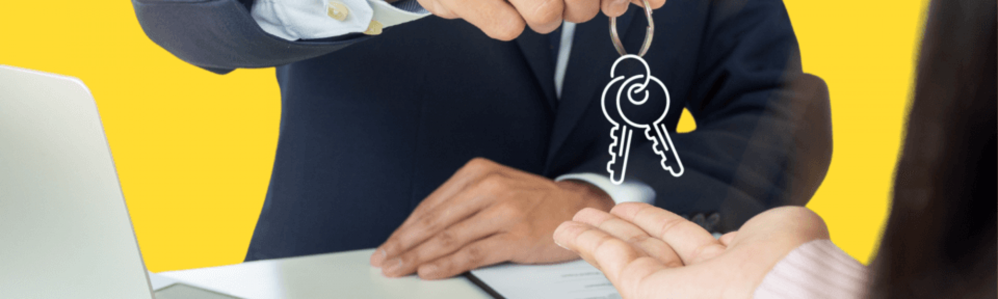 Man handing another person a set of keys