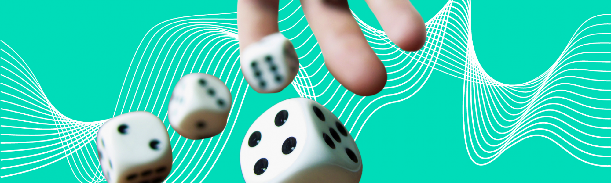 A hand rolling 5 dice