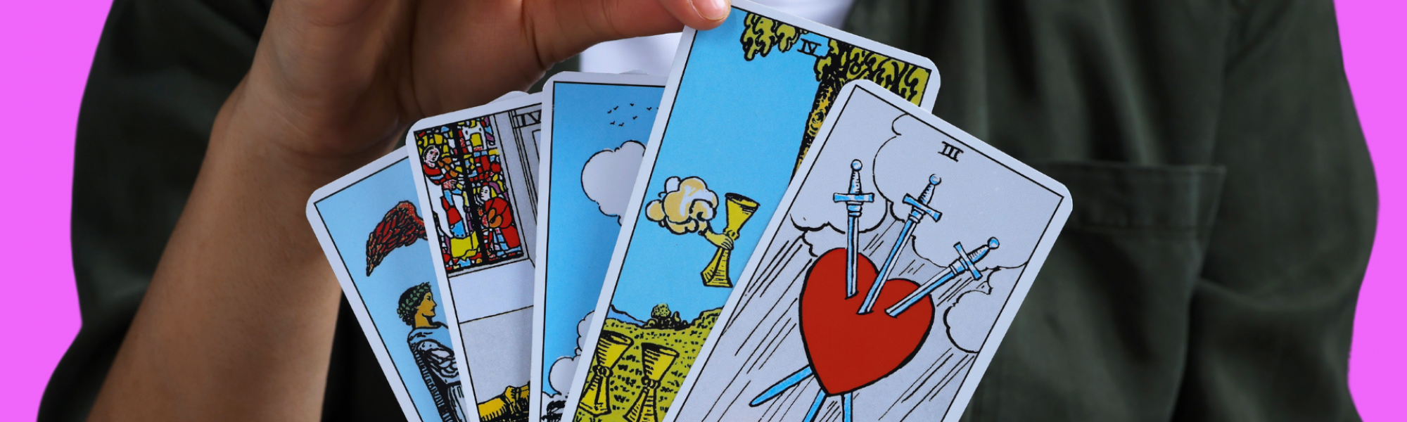 A person holding a deck of psychic cards.